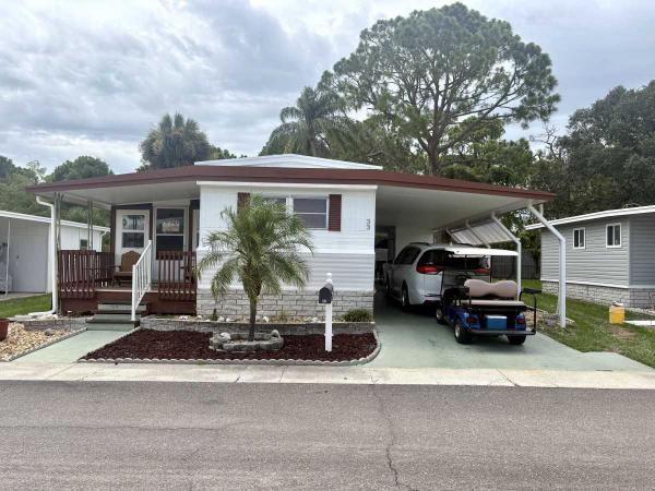 Photo 1 of 2 of home located at 1100 Curlew Road Lot 33 Dunedin, FL 34698