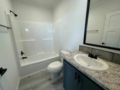 Photo 4 of 11 of home located at 18 Secluded Ranch Bend Willis, TX 77318