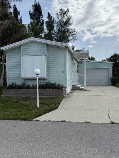 Photo 1 of 10 of home located at 701 Aqui Esta Drive Lot 62 Punta Gora, FL 33950