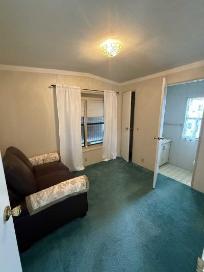 Photo 3 of 10 of home located at 701 Aqui Esta Drive Lot 62 Punta Gora, FL 33950
