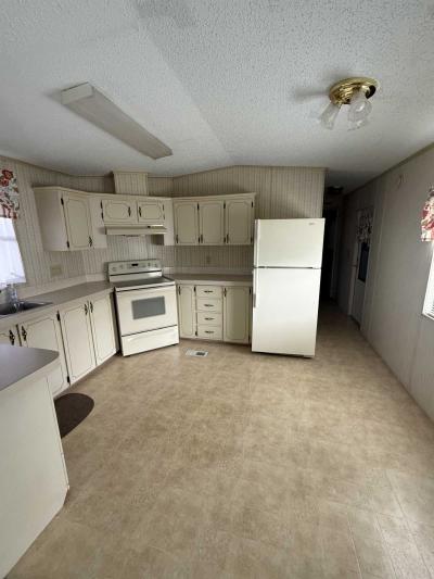 Photo 4 of 10 of home located at 701 Aqui Esta Drive Lot 62 Punta Gora, FL 33950