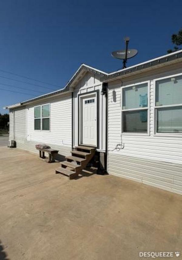 Photo 1 of 2 of home located at Greater Texas Home Buyers Llc 7770 Us Hwy 59 Goodrich, TX 77335