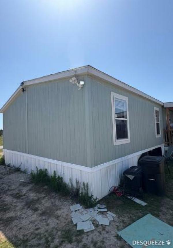 Photo 1 of 2 of home located at Greater Texas Home Buyers Llc 7770 Us Hwy 59 Goodrich, TX 77335