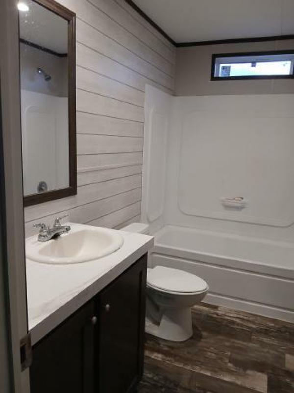 Photo 1 of 2 of home located at Clearance Homes Of Texas 12918 Highway 59 Ih 69 Splendora, TX 77372