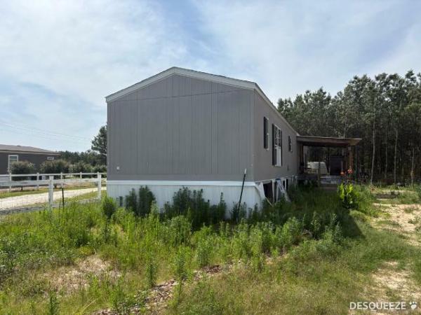 Photo 1 of 2 of home located at Greater Texas Home Buyers Llc 7770 Us Hwy 59 Goodrich, TX 77335