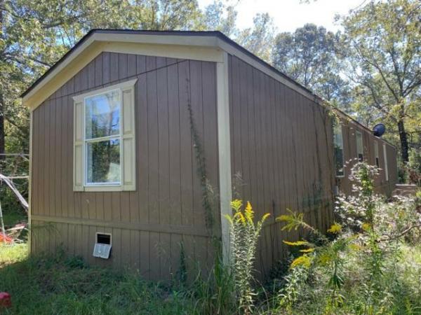 Photo 1 of 2 of home located at Milford Enterprise Inc. 8652 Us Highway 96 N Brookeland, TX 75931