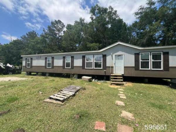 Photo 1 of 2 of home located at Milford Enterprise Inc. 8652 Us Highway 96 N Brookeland, TX 75931