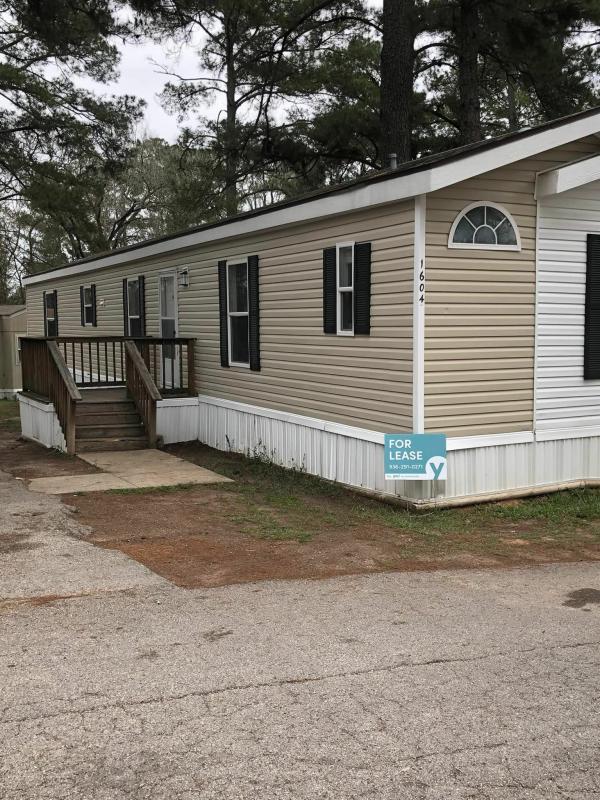 Photo 1 of 2 of home located at 1604 Wildwood Huntsville, TX 77340