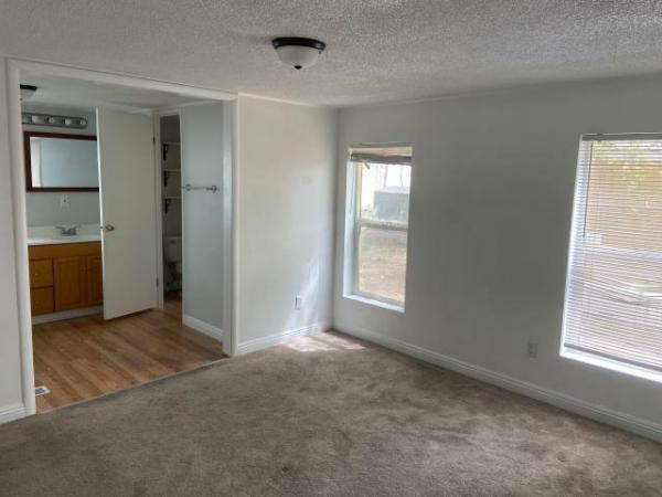 Photo 1 of 2 of home located at Quail Ridge 935 E Highway 193 Trlr 18 Layton, UT 84040