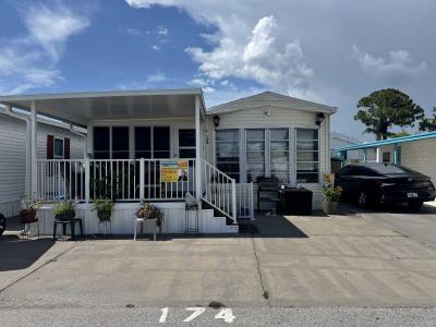 Photo 1 of 34 of home located at 6735 Hammock Rd Lot 174 Port Richey, FL 34668