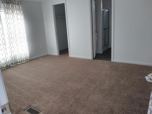 Photo 1 of 2 of home located at 601 S Vista Ln Lot #151 Edmond, OK 73034