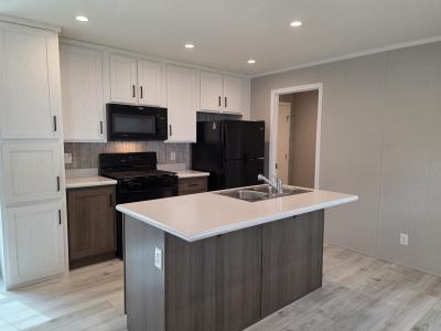 Photo 2 of 7 of home located at 232 Maclaren Ct Highland, MI 48357