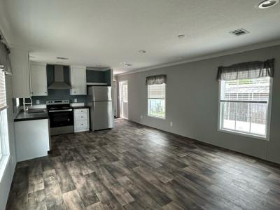 Photo 4 of 13 of home located at 1300 Hand Ave Lot F2 Ormond Beach, FL 32174