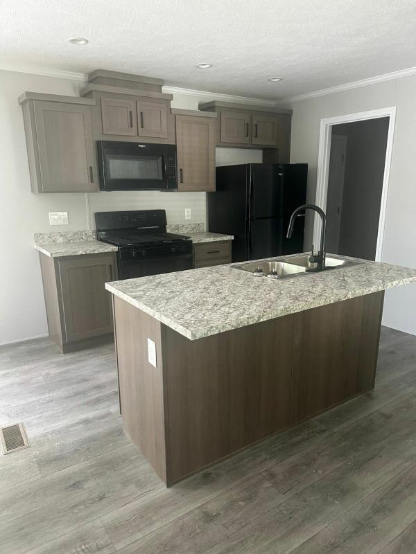 Photo 1 of 2 of home located at 13318 S. Dixie Hwy. # 36 Holly, MI 48442