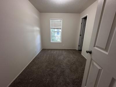 Photo 4 of 5 of home located at 13681 Pinewood Drive Grand Haven, MI 49417