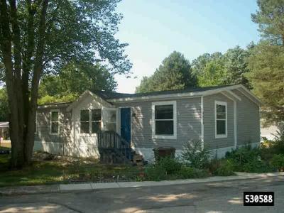 Mobile Home at Woodland Estates 4428 Mosswood Ave NE Rockford, MI 49341