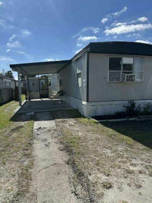 Photo 1 of 2 of home located at 713 Rose Street Lot 60 Auburndale, FL 33823