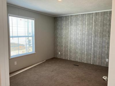 Photo 4 of 5 of home located at 2313 Hawaii Drive, Site # 23 Janesville, WI 53548