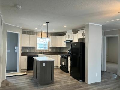 Photo 5 of 9 of home located at 2309 Hawaii Drive, Site # 21 Janesville, WI 53548