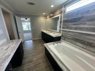 Photo 4 of 24 of home located at 11 Bonnet Street Willis, TX 77318