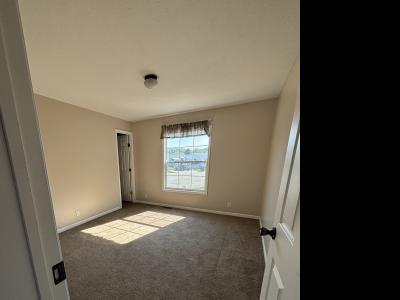 Photo 5 of 6 of home located at 490 Tanglewood Dr Site 084 Middleville, MI 49333