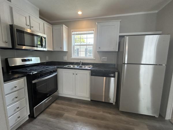 Photo 1 of 2 of home located at 2391 Eight Mile Road Kawkawlin, MI 48631