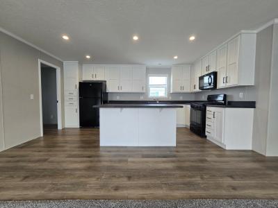 Photo 1 of 11 of home located at 7204 East Grand River Ave Lot 437 Portland, MI 48875