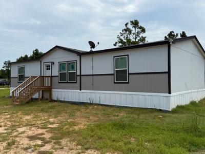 Mobile Home at 7020 County Road 5913-10 Cleveland, TX 77327