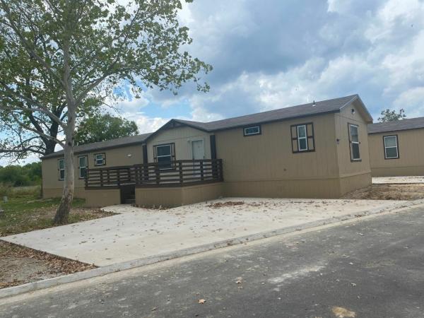 Photo 1 of 2 of home located at 1158 Village St Lot #644 Greenville, TX 75401