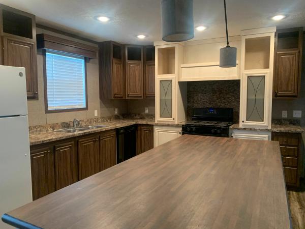 Photo 1 of 2 of home located at 45640 Chateau Thierry Dr., Site #323 Macomb, MI 48044