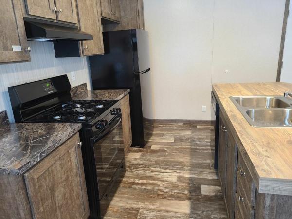 Photo 1 of 2 of home located at 3242 Spring Hill Court Lot 137 Muskegon, MI 49444