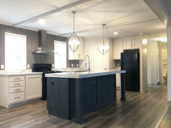 Photo 1 of 2 of home located at 13845 Alaska Ave Lot 266 Eagle, MI 48822
