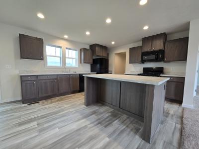 Photo 1 of 13 of home located at 7204 East Grand River Ave Lot 445 Portland, MI 48875