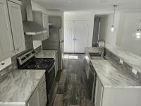2022 Champion Signature Series - 1/2 porch Manufactured Home