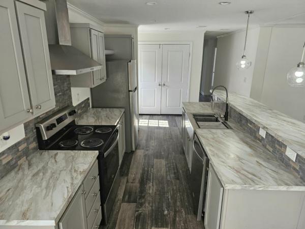 2022 Champion Signature Series - 1/2 porch Manufactured Home
