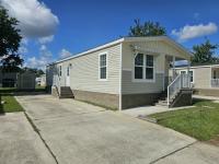 2022 Champion Signature Series - 1/2 porch Manufactured Home