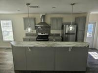 2022 Champion Signature Series - 1/2 porch Manufactured Home