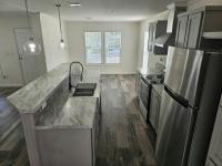 2022 Champion Signature Series - 1/2 porch Manufactured Home