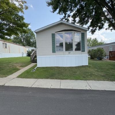 Photo 1 of 15 of home located at 37 Charlevoix St New Hudson, MI 48165