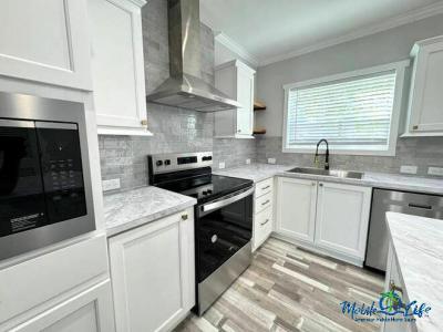 Photo 5 of 28 of home located at 30700 Us Highway 19 N Lot 111 Palm Harbor, FL 34684
