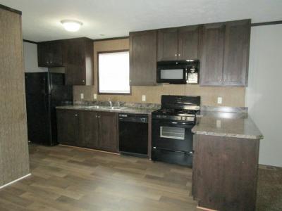 Photo 4 of 15 of home located at 17324 Oak Grove Brownstown, MI 48174