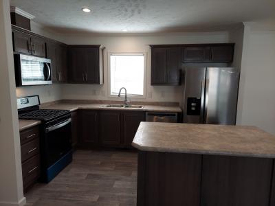 Photo 4 of 9 of home located at 2222 Douglas Dr Highland, MI 48357