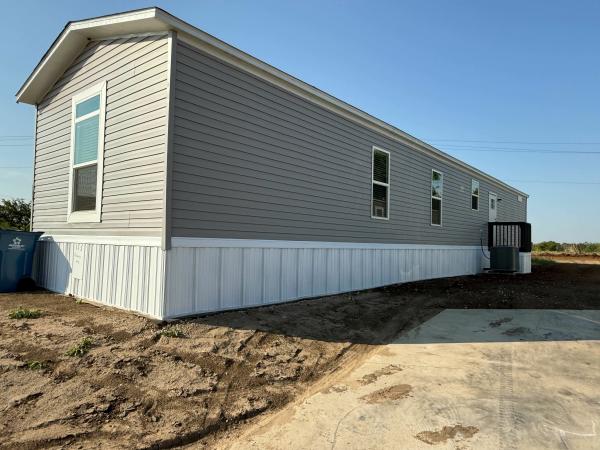 Photo 1 of 2 of home located at 133 Ponderosa Way #Pond133 Sanger, TX 76266