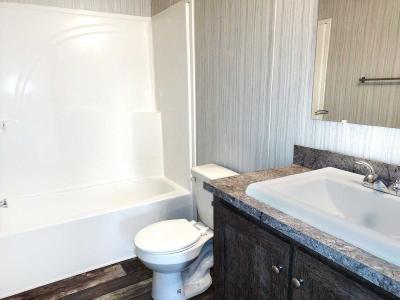 Photo 4 of 5 of home located at 1180 Briar Downs Ln Lot 45 Burton, MI 48529