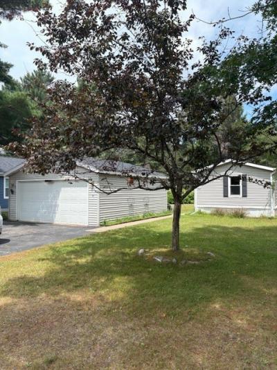 Photo 1 of 14 of home located at 8918 Woodridge Ln Woodruff, WI 54568