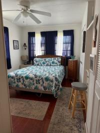 1970 Rama 2/1.5 single with enclosed sunroom  Manufactured Home