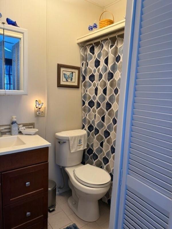 1970 Rama 2/1.5 single with enclosed sunroom  Manufactured Home