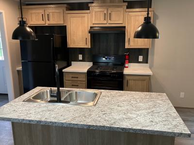 Photo 2 of 10 of home located at 1054 South Park Drive Brookfield, OH 44403