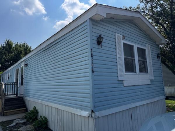 Photo 1 of 2 of home located at 48598 Sandifer Ct #211 Shelby Township, MI 48317