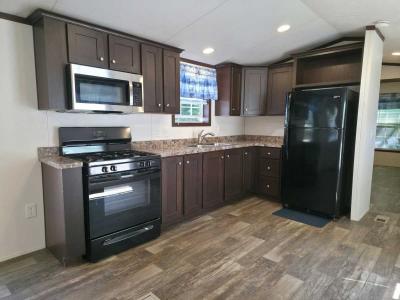 Photo 4 of 21 of home located at 31 Windbrook Dr Auburn, MA 01501